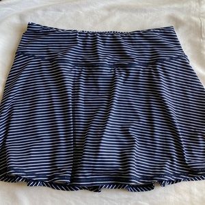 Blue and white striped tennis/golf/movement skirt. Size M